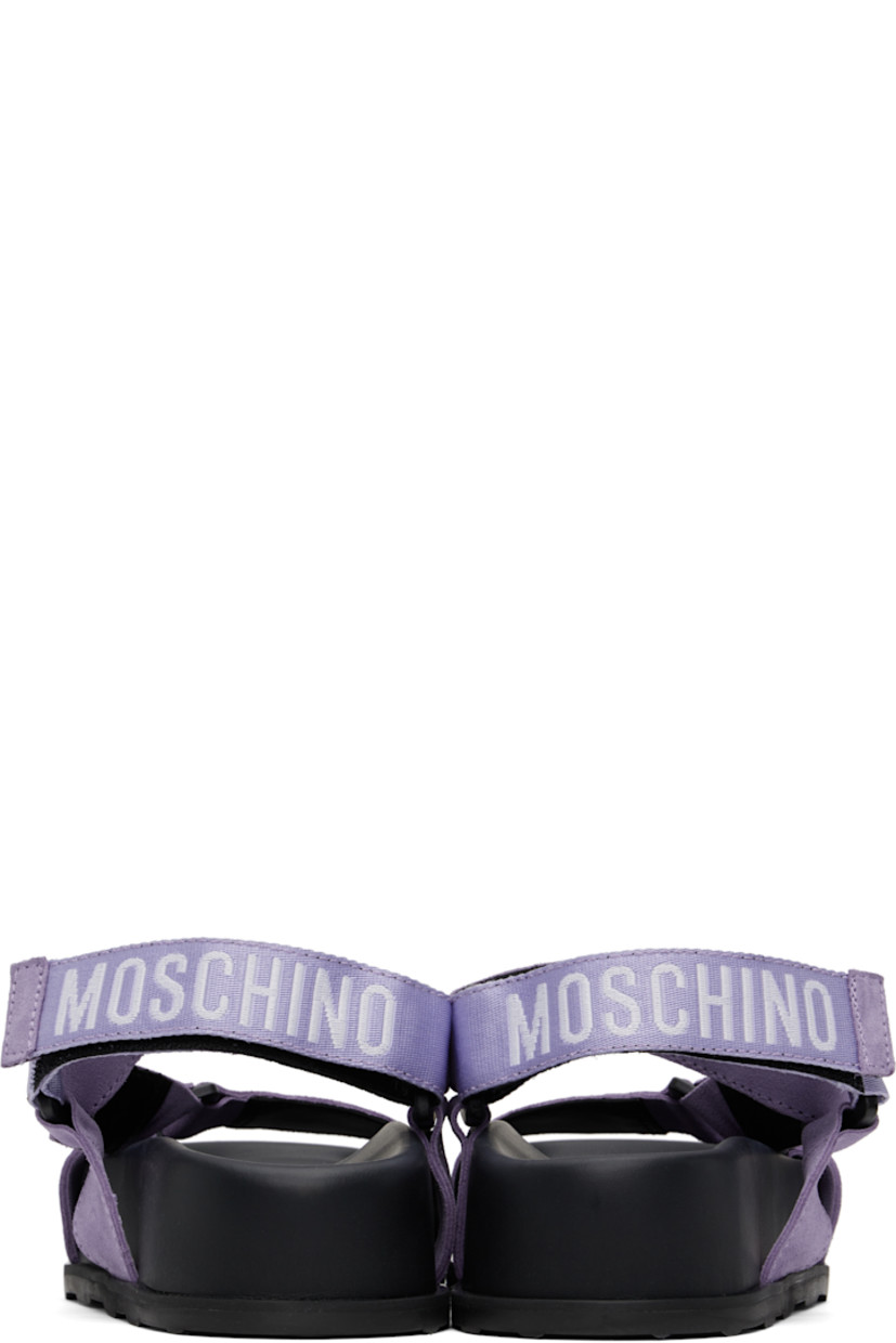 Suede sandals in purple and black. 

· Velcro strap at vamp
· Logo-woven webbing ankle strap
· Logo stamp at molded footbed
· Partial grained calfskin lining
· Platform rubber midsole
· Treaded rubber sole
· Platform: H1.75"

Supplier color: Lilac