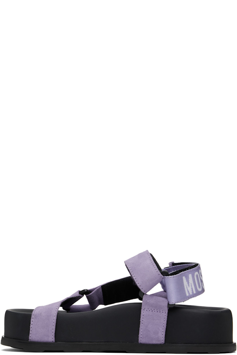 Suede sandals in purple and black. 

· Velcro strap at vamp
· Logo-woven webbing ankle strap
· Logo stamp at molded footbed
· Partial grained calfskin lining
· Platform rubber midsole
· Treaded rubber sole
· Platform: H1.75"

Supplier color: Lilac