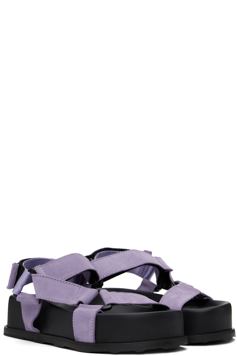Suede sandals in purple and black. 

· Velcro strap at vamp
· Logo-woven webbing ankle strap
· Logo stamp at molded footbed
· Partial grained calfskin lining
· Platform rubber midsole
· Treaded rubber sole
· Platform: H1.75"

Supplier color: Lilac