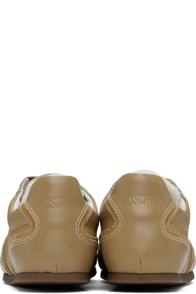 Low-top buffed calfskin and suede sneakers in taupe.

· Lace-up closure
· Logo embossed at padded tongue 
· Padded collar
· Logo embossed at heel tab
· Terrycloth lining
· Crêpe rubber sole

Supplier color: Beige/beige
