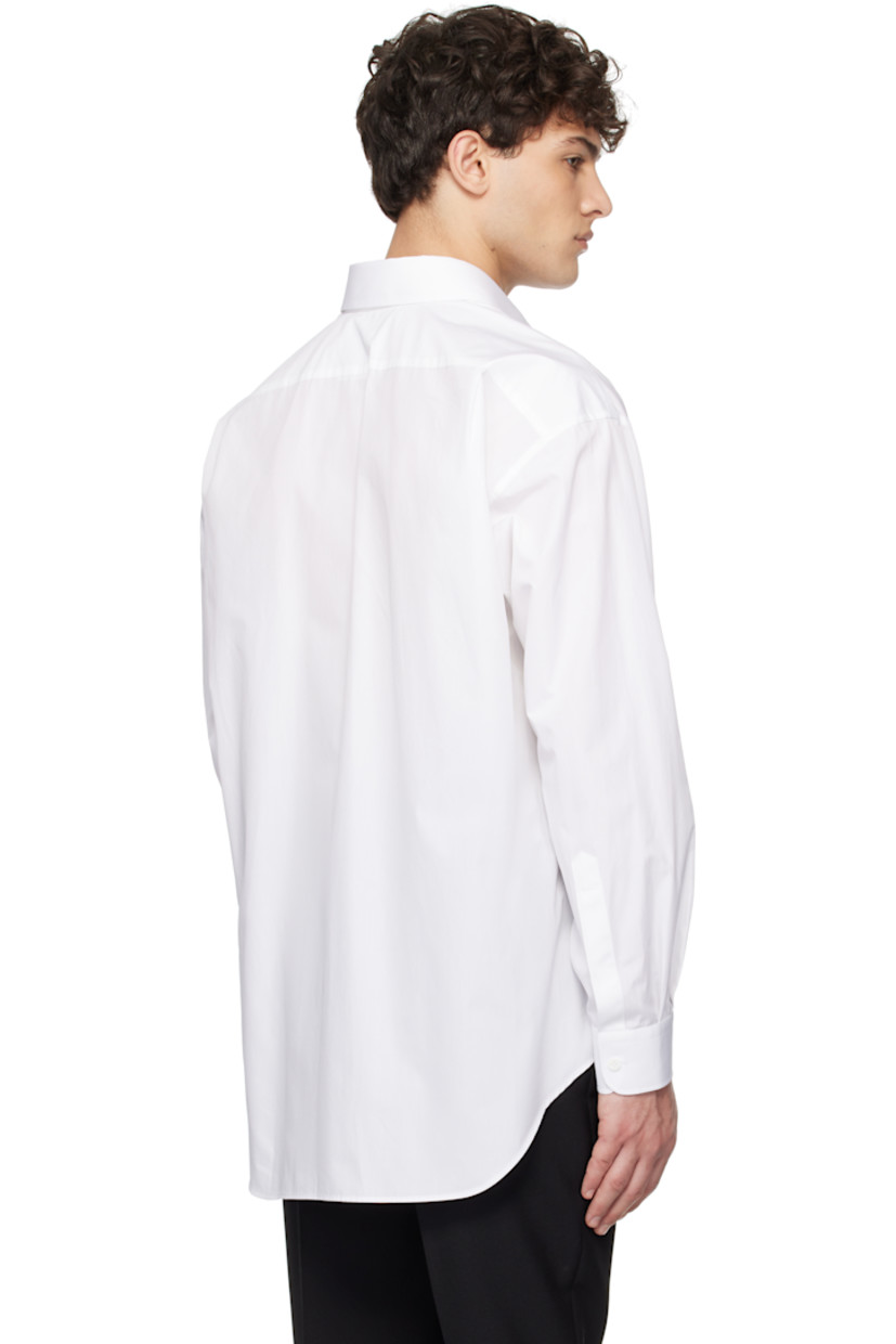 Cotton poplin shirt.

· Spread collar
· Concealed button closure
· Graphics printed at chest
· Logo embroidered at front
· Shirttail hem
· Dropped shoulders
· Pleats at single-button barrel cuffs
· Twin pleats at back yoke

Supplier color: Multi white