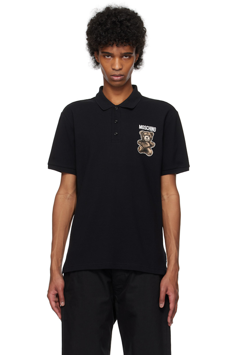 Cotton piqué polo.

· Rib-knit spread collar and cuffs
· Three-button placket
· Logo and graphic printed at chest
· Tennis-tail hem

Supplier color: Multi black