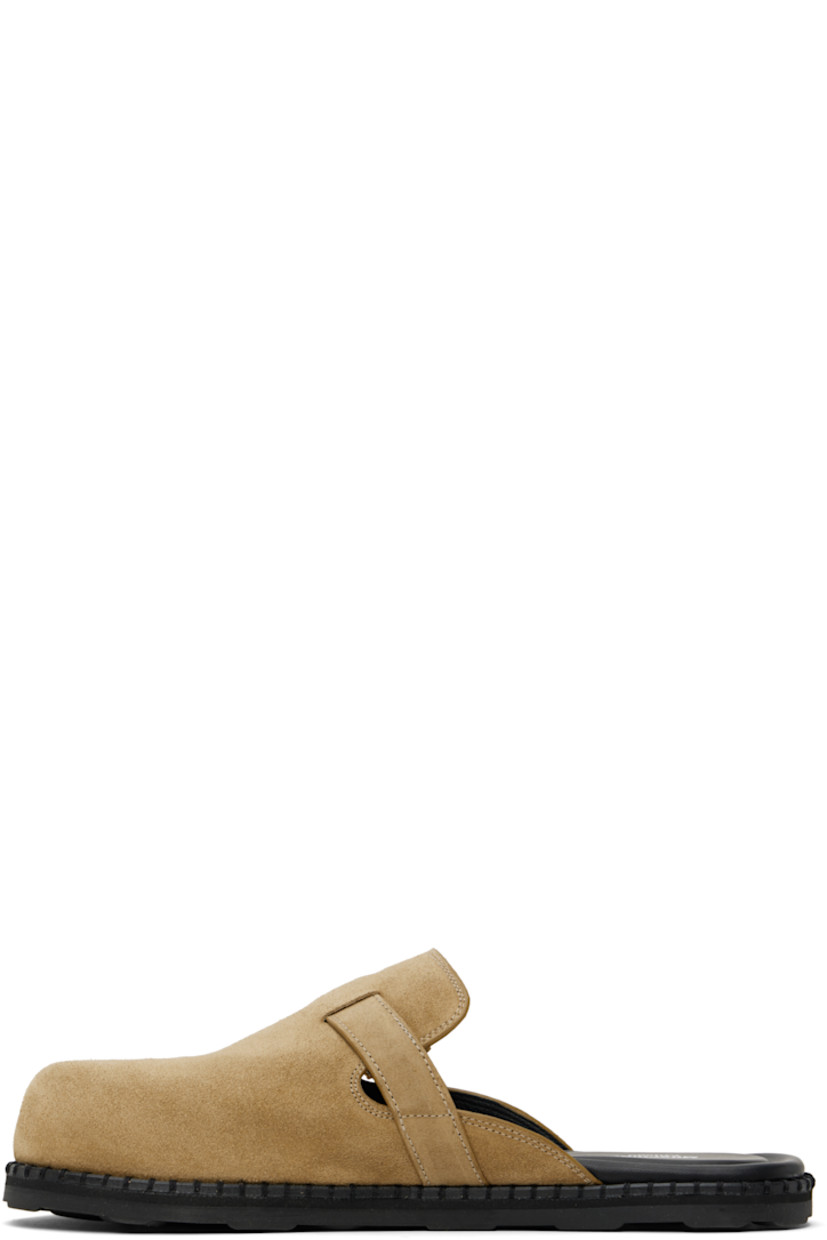 Calfskin suede slip-on loafers in beige. 

· Pin-buckle strap at vamp
· Logo printed at molded leather footbed
· Grained calfskin and sheepskin lining
· Treaded rubber sole

Supplier color: Beige
