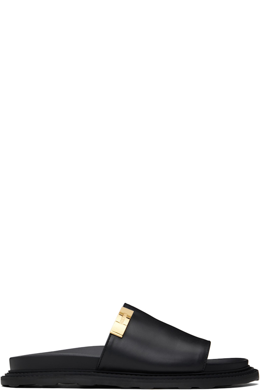 Grained calfskin sandals in black.

· Logo plaque at vamp
· Logo stamp at molded footbed
· Buffed calfskin lining
· Treaded rubber sole

Supplier color: Black