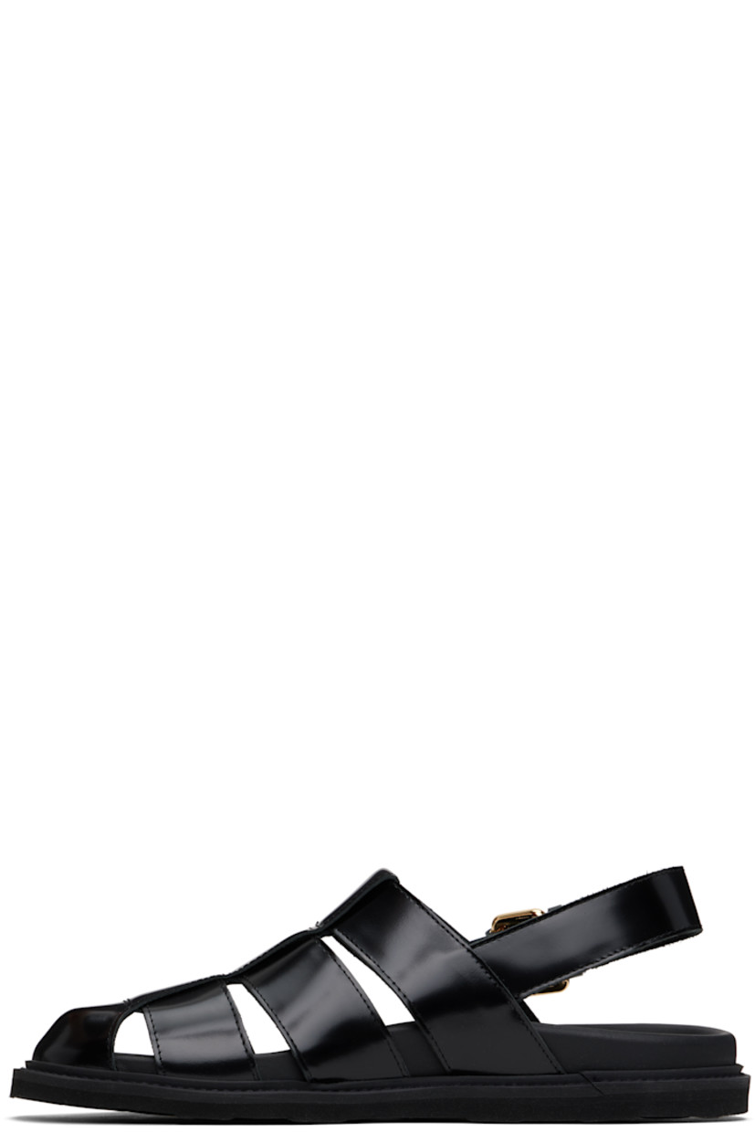 Polished calfskin sandals in black.

· Closed toe
· Pin-buckle ankle strap
· Logo stamp at molded footbed
· Grained calfskin lining
· Treaded rubber sole

Supplier color: Black
