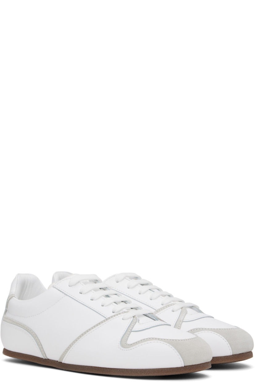 Low-top buffed calfskin and suede sneakers in white.

· Lace-up closure
· Logo embossed at padded tongue 
· Padded collar
· Logo embossed at heel tab
· Terrycloth lining
· Crêpe rubber sole

Supplier color: White/White
