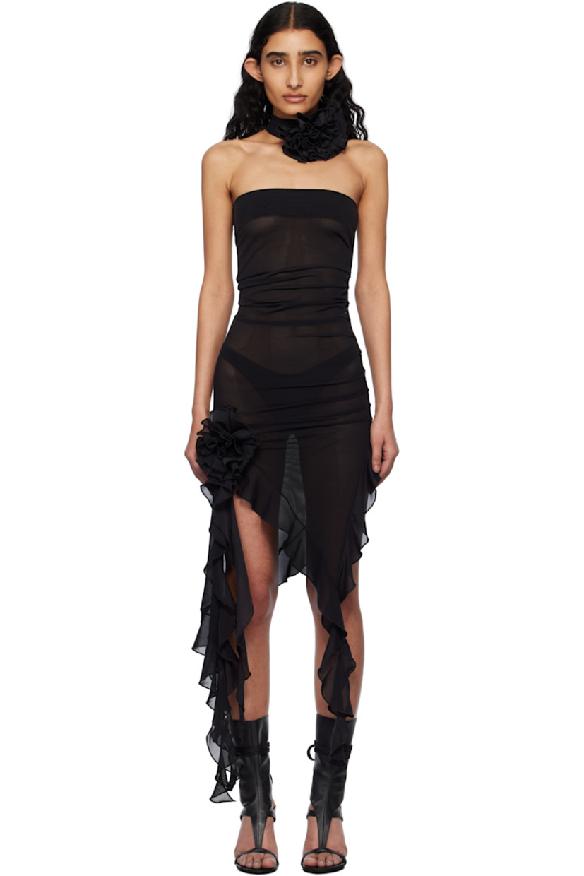 Sheer stretch nylon mesh midi dress. 

· Straight neck
· Floral appliqué at front
· Extended ruffled trim at asymmetric hem
· Gathering at side seams
· Unlined
· Includes self-tie strap with floral appliqué 

Supplier color: Black