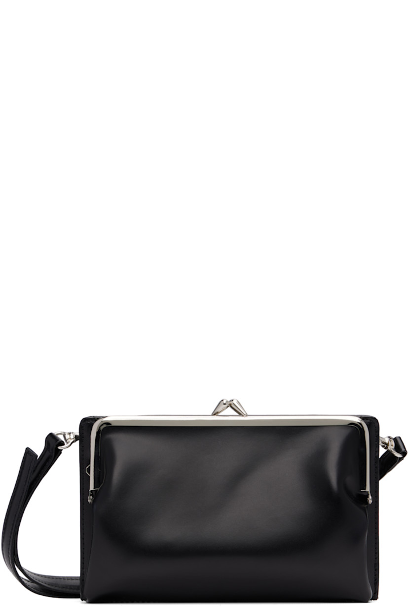 Buffed leather shoulder bag.

· Three-compartment construction
· Adjustable and detachable crossbody strap
· Kiss-lock and magnetic press-stud closure
· Four card slots at interior
· Buffed leather lining
· H5.25" x W7" x D2.5"

Supplier color: Black