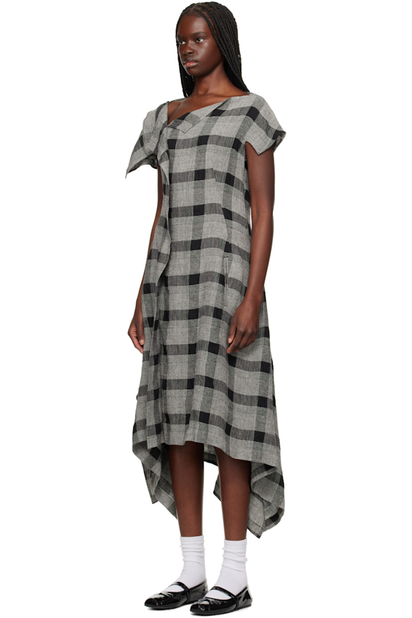 Linen- and silk-blend hopsack midi dress. Check pattern throughout.

· Asymmetrical construction
· Boatneck
· Welt pocket at front
· Zip closure at side seam
· Vented cap sleeves

Supplier color: Black