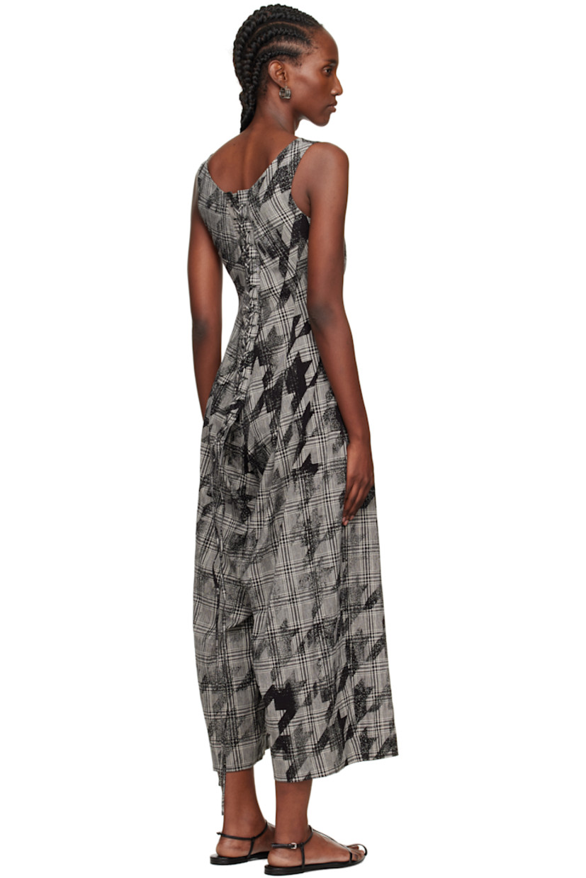 Plain-woven cotton- and linen-blend jumpsuit. 

· Houndstooth and check pattern throughout 
· Round neck
· Zip closure at side seam
· Two-pocket styling
· Lace-up closure at back

Supplier color: Black