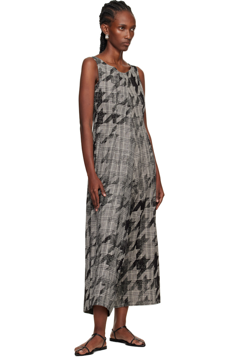 Plain-woven cotton- and linen-blend jumpsuit. 

· Houndstooth and check pattern throughout 
· Round neck
· Zip closure at side seam
· Two-pocket styling
· Lace-up closure at back

Supplier color: Black