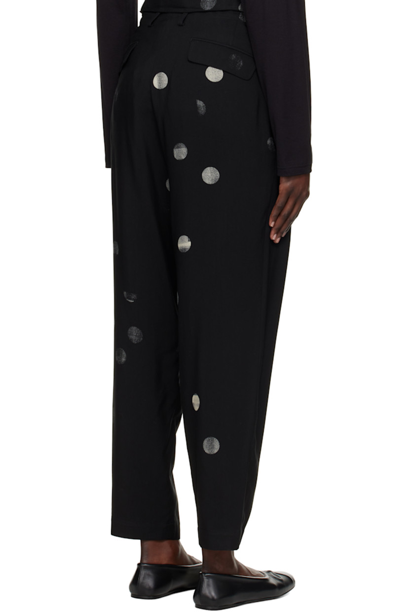 Rayon- and cupro-blend twill trousers. Dot pattern printed throughout. 

· High-rise
· Belt loops
· Self-tie drawstring at waistband
· Four-pocket styling
· Zip fly

Supplier color: Black