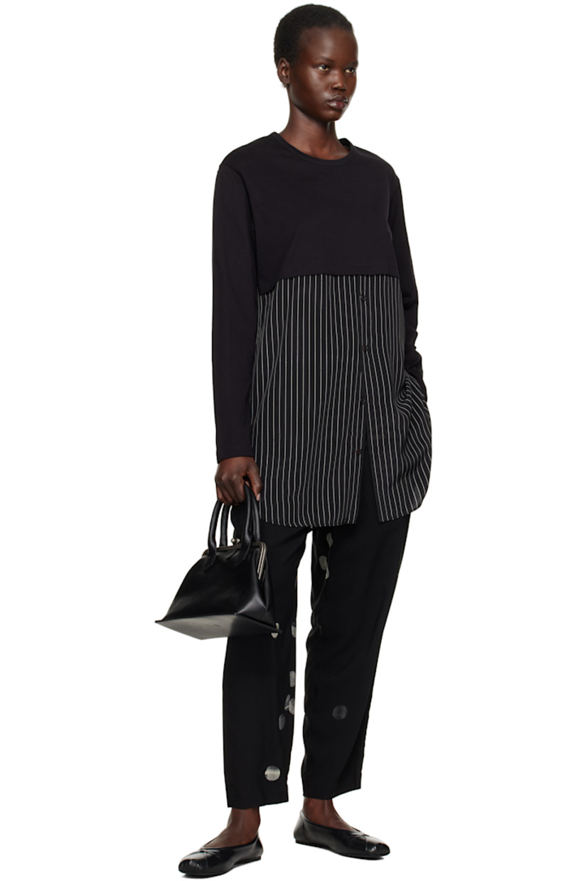 Rayon- and cupro-blend twill trousers. Dot pattern printed throughout. 

· High-rise
· Belt loops
· Self-tie drawstring at waistband
· Four-pocket styling
· Zip fly

Supplier color: Black