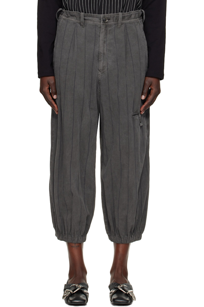 Cotton twill trousers. Stripes throughout. 

· Belt loops
· Concealed drawstring at waistband
· Four-pocket styling
· Zip fly
· Welt pocket at front
· Cropped legs
· Elasticized cuffs 

Supplier color: Grey