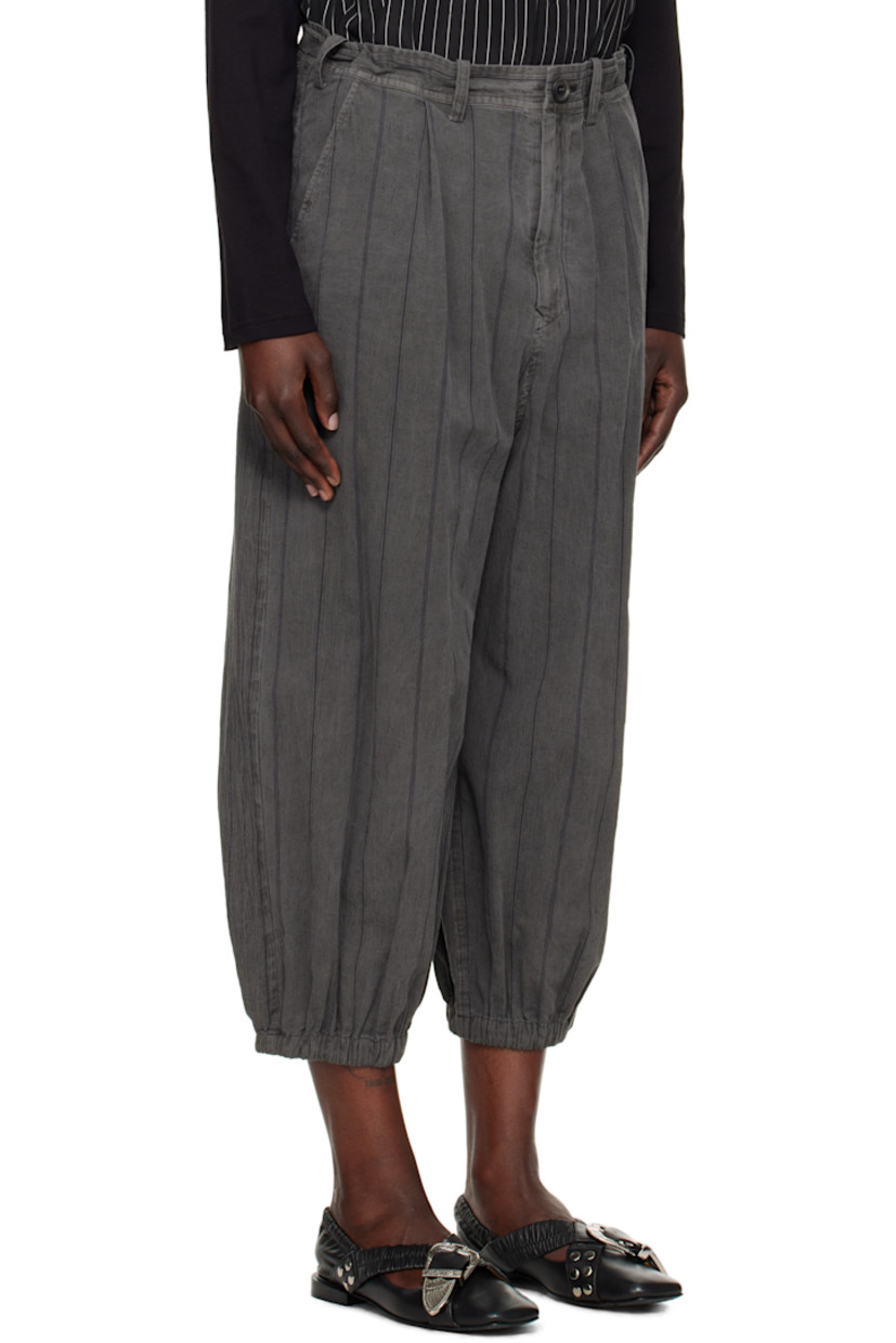 Cotton twill trousers. Stripes throughout. 

· Belt loops
· Concealed drawstring at waistband
· Four-pocket styling
· Zip fly
· Welt pocket at front
· Cropped legs
· Elasticized cuffs 

Supplier color: Grey