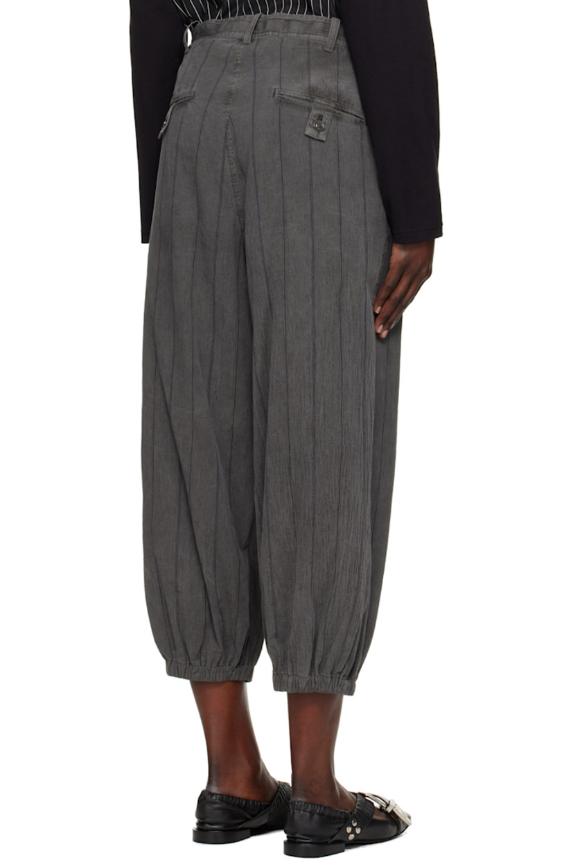 Cotton twill trousers. Stripes throughout. 

· Belt loops
· Concealed drawstring at waistband
· Four-pocket styling
· Zip fly
· Welt pocket at front
· Cropped legs
· Elasticized cuffs 

Supplier color: Grey