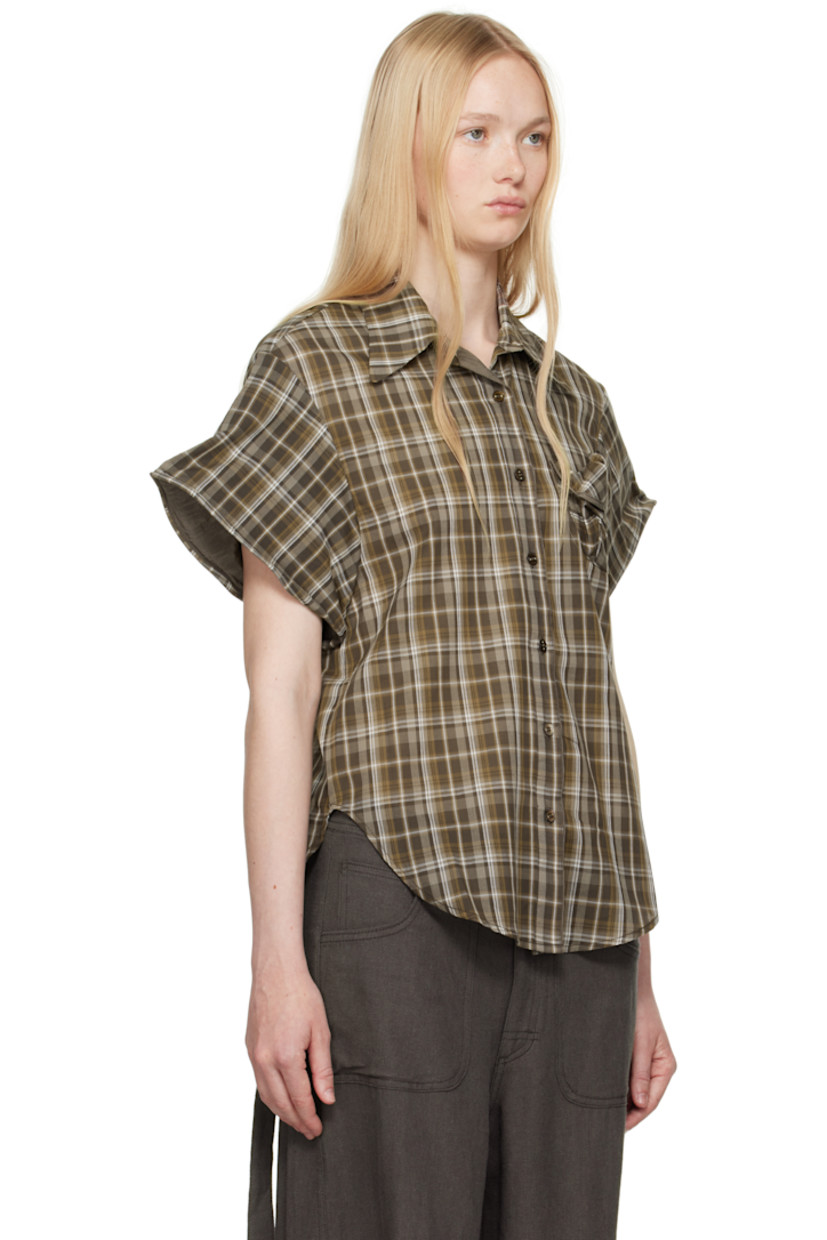 Cotton voile shirt. Check pattern throughout. 

· Spread collar
· Button closure
· Patch pocket at chest
· Shirttail hem
· Concealed pliable wire at cuffs
· Partially lined

Supplier color: Brown
