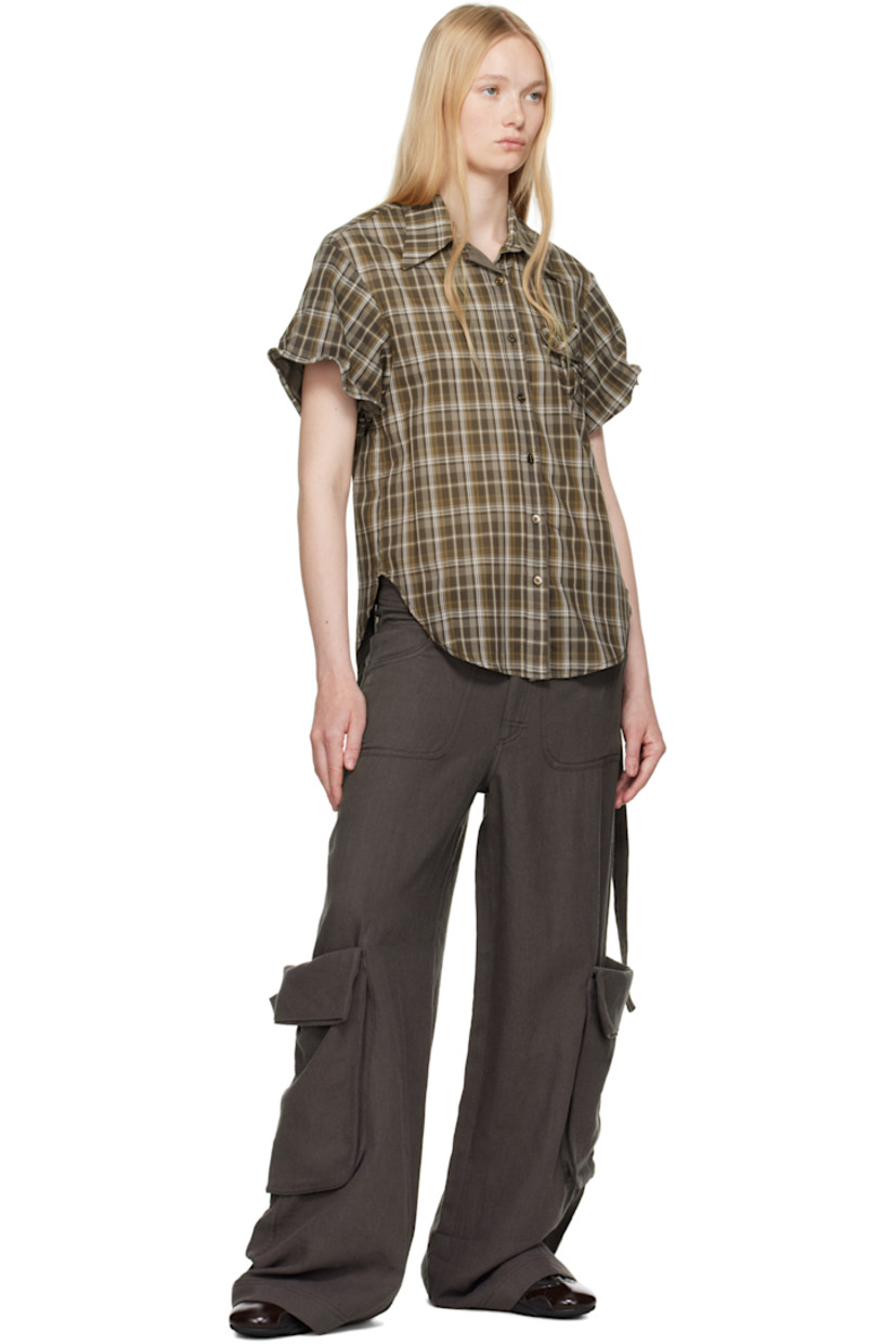 Cotton voile shirt. Check pattern throughout. 

· Spread collar
· Button closure
· Patch pocket at chest
· Shirttail hem
· Concealed pliable wire at cuffs
· Partially lined

Supplier color: Brown