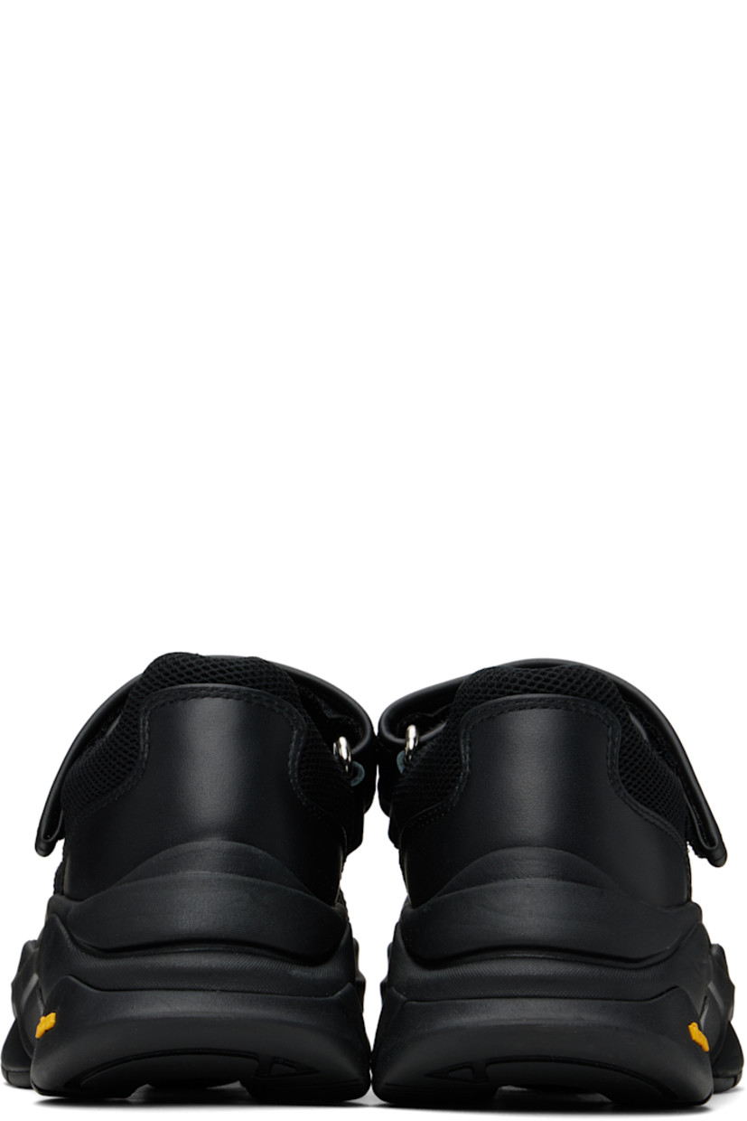 Low-top buffed leather and mesh sneakers in black.

· Cutout at vamp
· Velcro closure
· Mesh lining
· Sculptural foam rubber midsole
· Treaded lightweight Vibram® rubber sole
· Platform: H2"

Supplier color: Black
