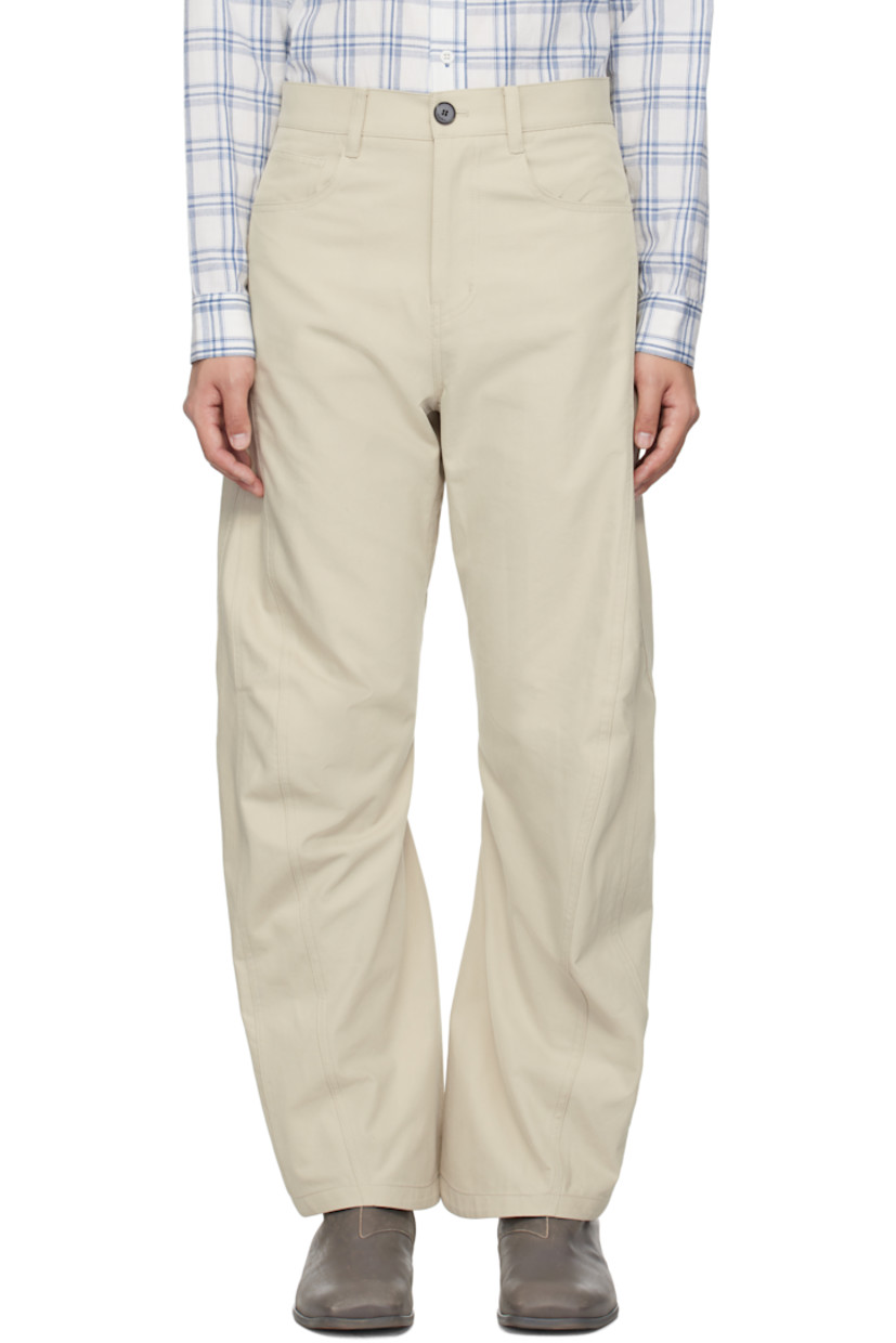 Cotton-blend twill trousers.

· Paneled construction
· Belt loops
· Five-pocket styling
· Zip fly
· Curved outseams
· Logo plaque at back pocket

Supplier color: Pale beige