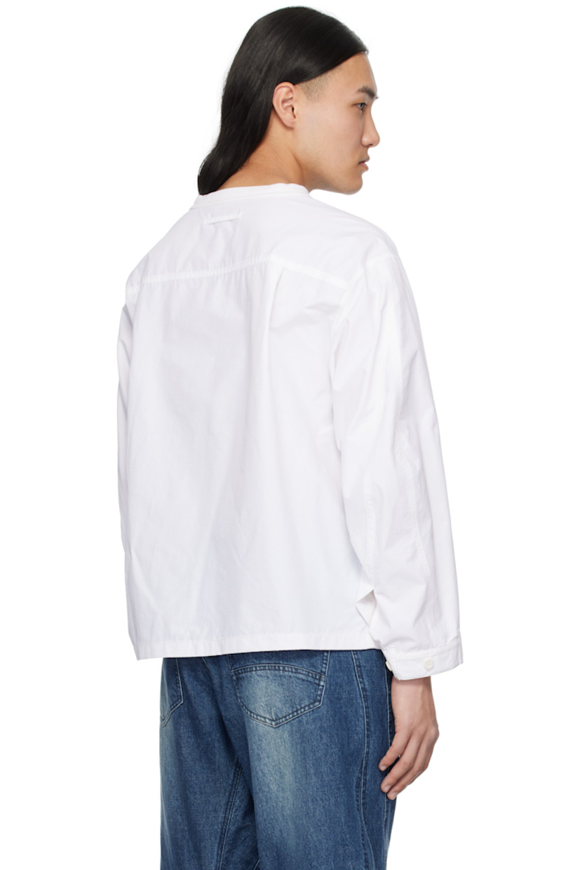 Nylon-blend poplin and cotton-blend jersey T-shirt.

· Paneled construction
· Crewneck
· Patch pocket at front
· Curved seam at sleeves
· Adjustable single-button cuffs
· Locker loop at back collar
· Pleats at back yoke

Supplier color: White