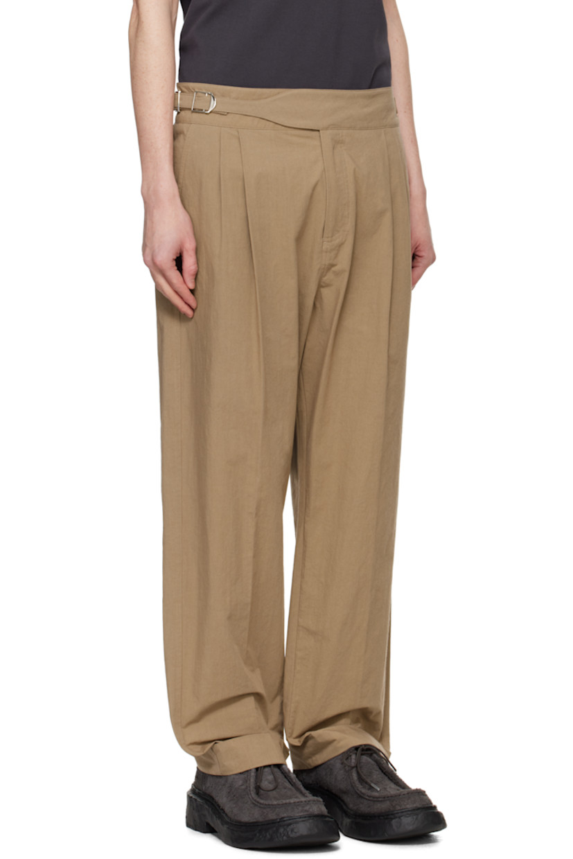 Cotton- and nylon-blend poplin trousers.

· Cinch tabs at waistband
· Four-pocket styling
· Zip-fly
· Pleats at front
· Rolled cuffs

Supplier color: Beige