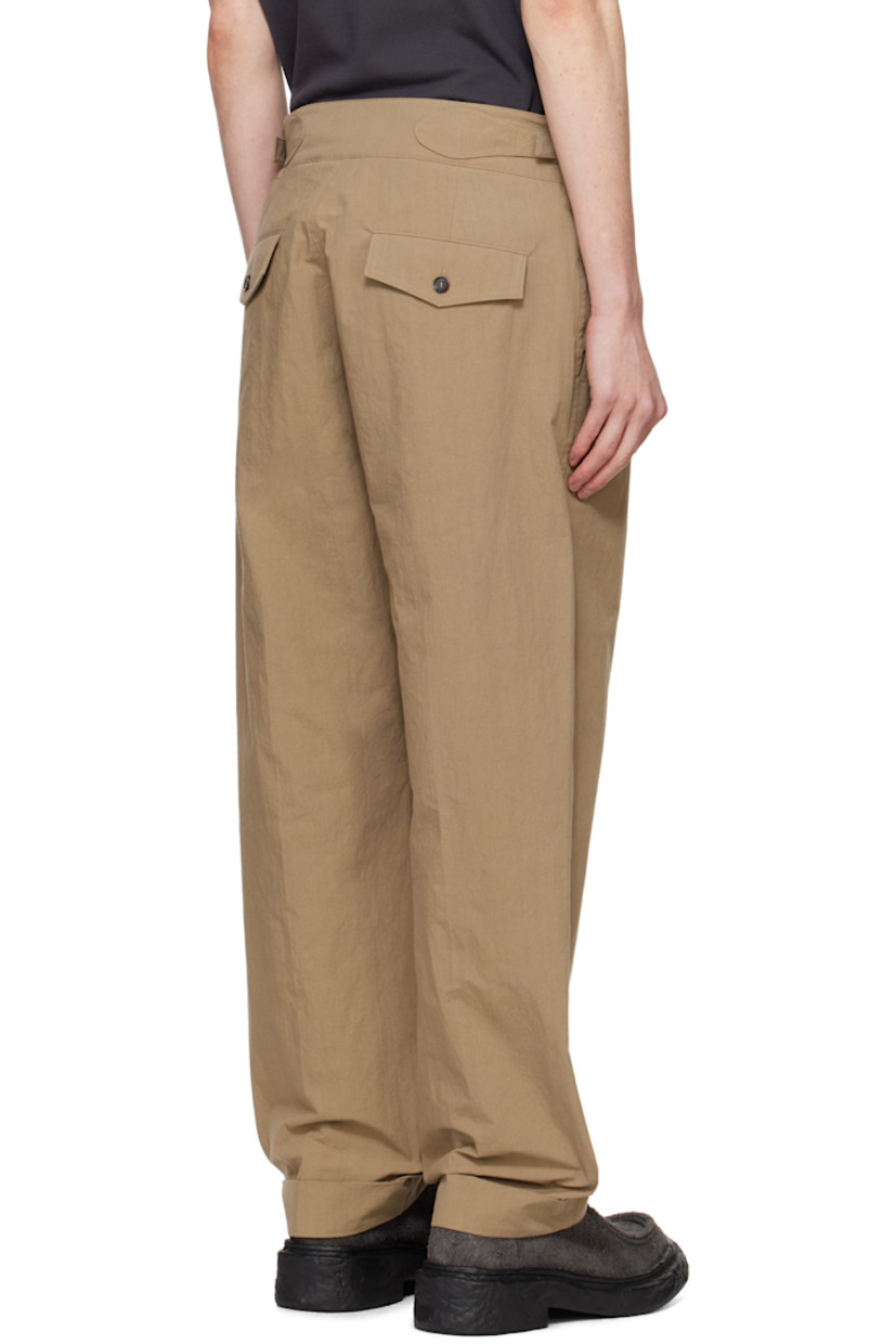 Cotton- and nylon-blend poplin trousers.

· Cinch tabs at waistband
· Four-pocket styling
· Zip-fly
· Pleats at front
· Rolled cuffs

Supplier color: Beige