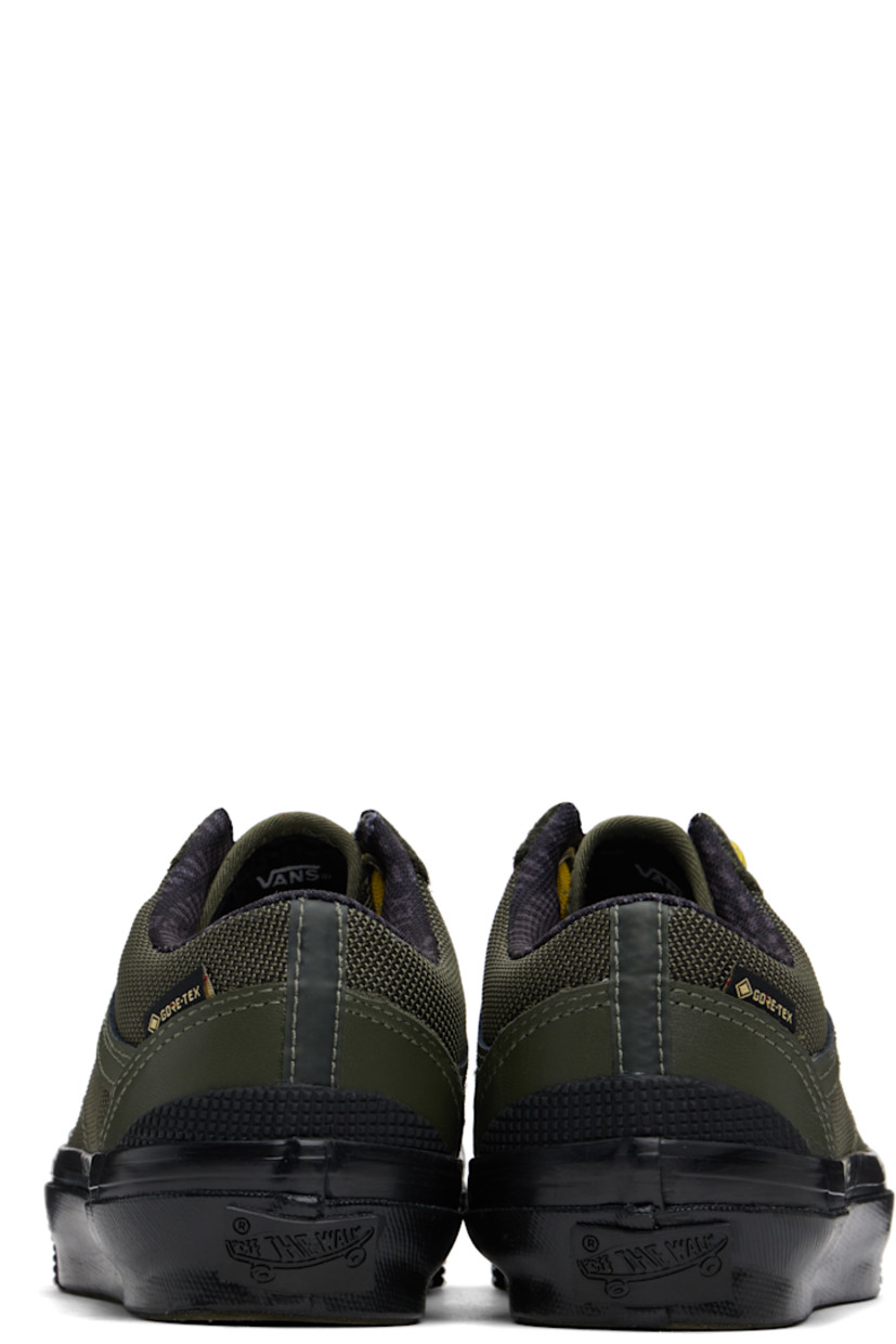Low-top GORE-TEX™ nylon canvas sneakers in khaki. 

· Buffed leather trim throughout
· Lace-up closure
· Padded collar
· Buffed leather Sidestripe™ at sides
· Logo flag at heel counter
· Padded Sola ADC foam footbed
· Logo-woven mesh lining
· Rubberized logo patch at heel
· Treaded rubber sole

Supplier color: Grape leaf