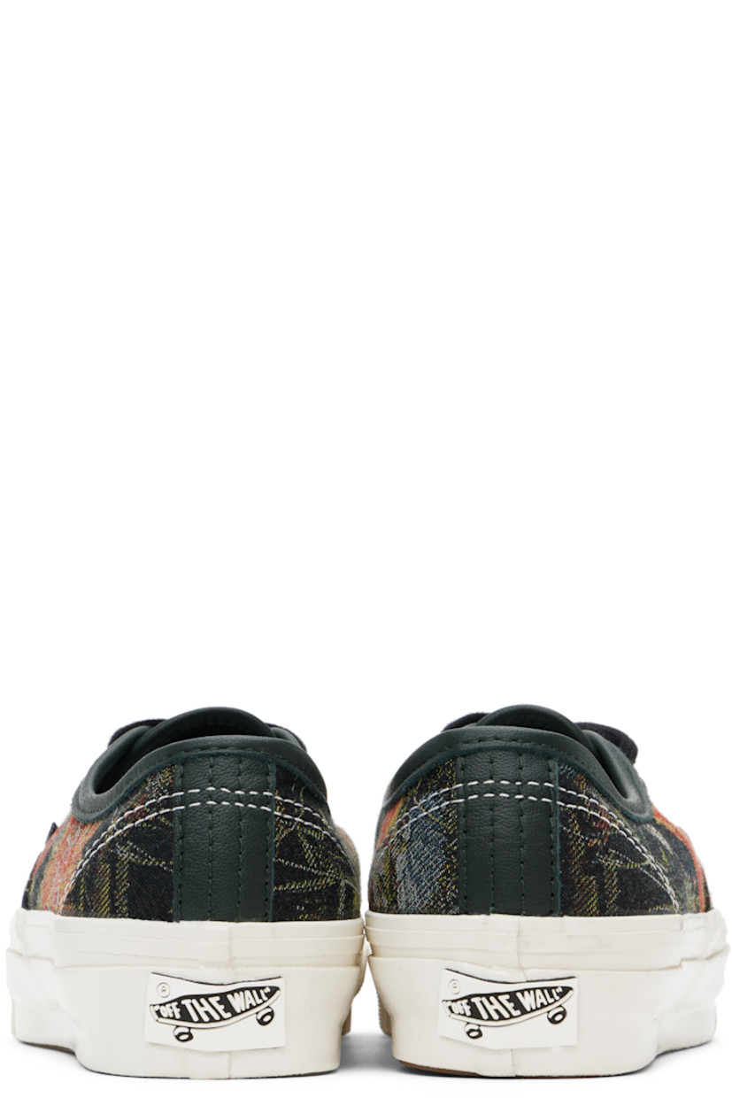 Low-top twill sneakers in black.

· Jacquard floral pattern throughout
· Lace-up closure
· Logo flag at outer side
· Padded Sola ADC foam footbed
· Canvas lining
· Rubberized logo patch at heel
· Treaded rubber sole
· Contrast stitching in white

Supplier color: Floral black