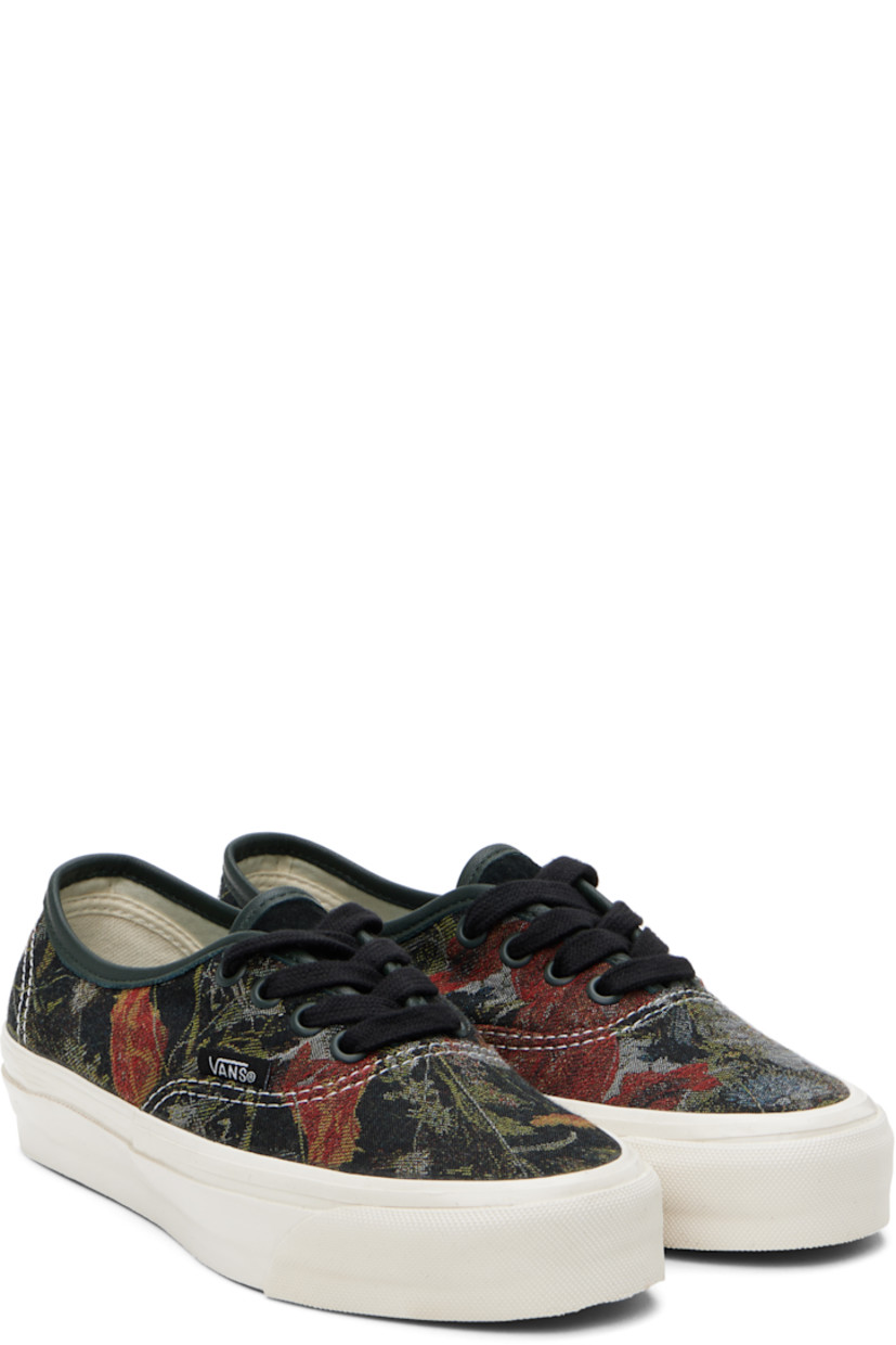 Low-top twill sneakers in black.

· Jacquard floral pattern throughout
· Lace-up closure
· Logo flag at outer side
· Padded Sola ADC foam footbed
· Canvas lining
· Rubberized logo patch at heel
· Treaded rubber sole
· Contrast stitching in white

Supplier color: Floral black