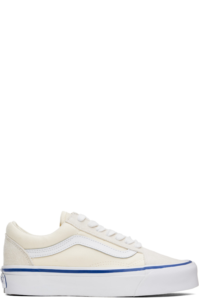 Low-top 8 oz canvas and suede sneakers in off-white.

· Lace-up closure
· Padded tongue and collar
· Grained leather Sidestripe™ at sides
· Padded Sola ADC foam footbed
· Grained leather and canvas lining
· Rubberized logo patch at heel
· Treaded rubber sole
· Contrast stitching in white

Supplier color: Lx off-white