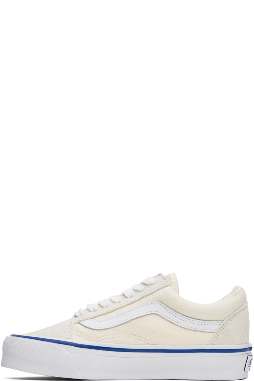 Low-top 8 oz canvas and suede sneakers in off-white.

· Lace-up closure
· Padded tongue and collar
· Grained leather Sidestripe™ at sides
· Padded Sola ADC foam footbed
· Grained leather and canvas lining
· Rubberized logo patch at heel
· Treaded rubber sole
· Contrast stitching in white

Supplier color: Lx off-white
