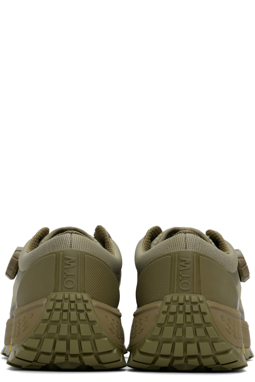 Low-top Dyneema® ripstop sneakers in khaki.

· Lightweight and breathable
· FIDLOCK® lace-up closure
· Logo bonded at padded tongue
· Padded collar
· Logo embossed at rubberized heel counter
· Mesh and suede lining
· Textured rubber midsole
· Treaded Vibram® rubber sole

Supplier color: Olive