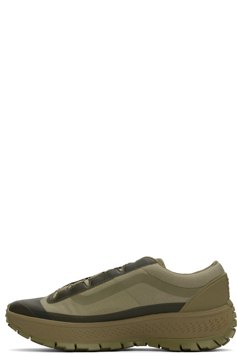 Low-top Dyneema® ripstop sneakers in khaki.

· Lightweight and breathable
· FIDLOCK® lace-up closure
· Logo bonded at padded tongue
· Padded collar
· Logo embossed at rubberized heel counter
· Mesh and suede lining
· Textured rubber midsole
· Treaded Vibram® rubber sole

Supplier color: Olive