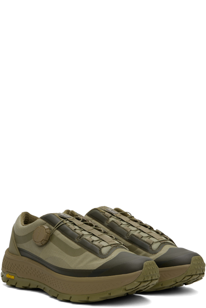 Low-top Dyneema® ripstop sneakers in khaki.

· Lightweight and breathable
· FIDLOCK® lace-up closure
· Logo bonded at padded tongue
· Padded collar
· Logo embossed at rubberized heel counter
· Mesh and suede lining
· Textured rubber midsole
· Treaded Vibram® rubber sole

Supplier color: Olive