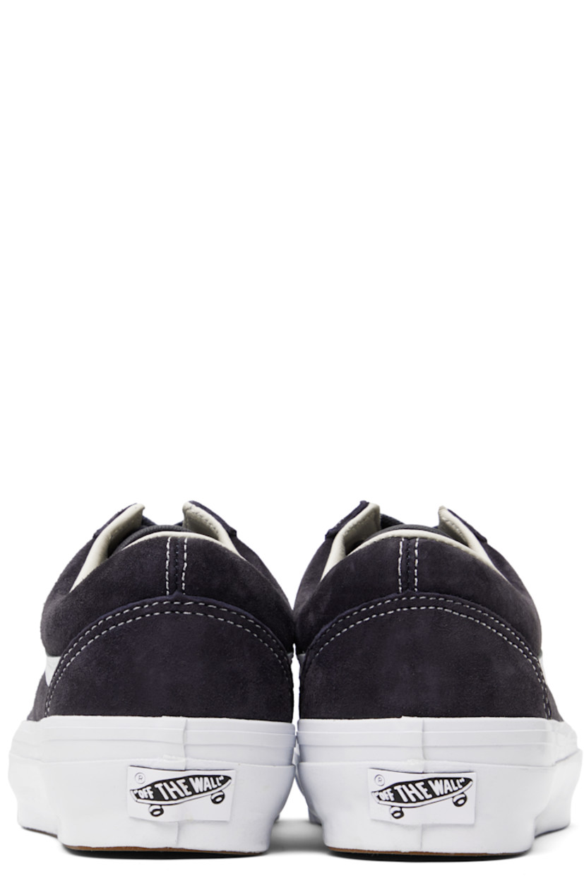 Low-top pigskin suede sneakers in navy.

· Lace-up closure
· Padded tongue and collar
· Grained leather Sidestripe™ at sides
· Rubberized logo patch at heel
· Grained leather and canvas lining
· Removable padded foam insole
· Treaded rubber sole
· Contrast stitching in white

Supplier color: Pig suede nine iron