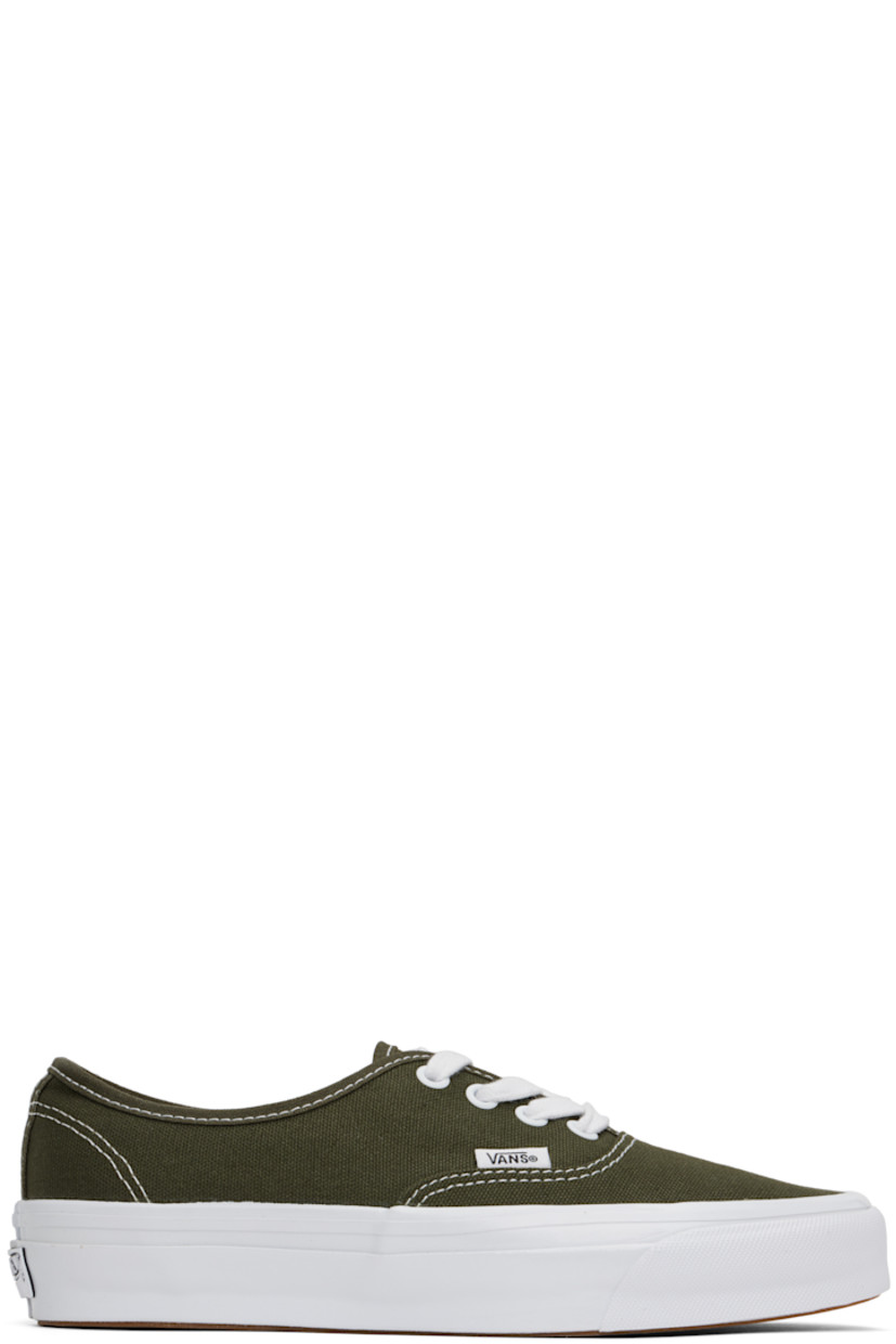 Low-top canvas sneakers in green.

· Lace-up closure
· Logo flag at outer side
· Grained leather and canvas lining
· Rubberized logo patch at heel
· Textured rubber midsole
· Treaded rubber sole

Supplier color: Grape leaf