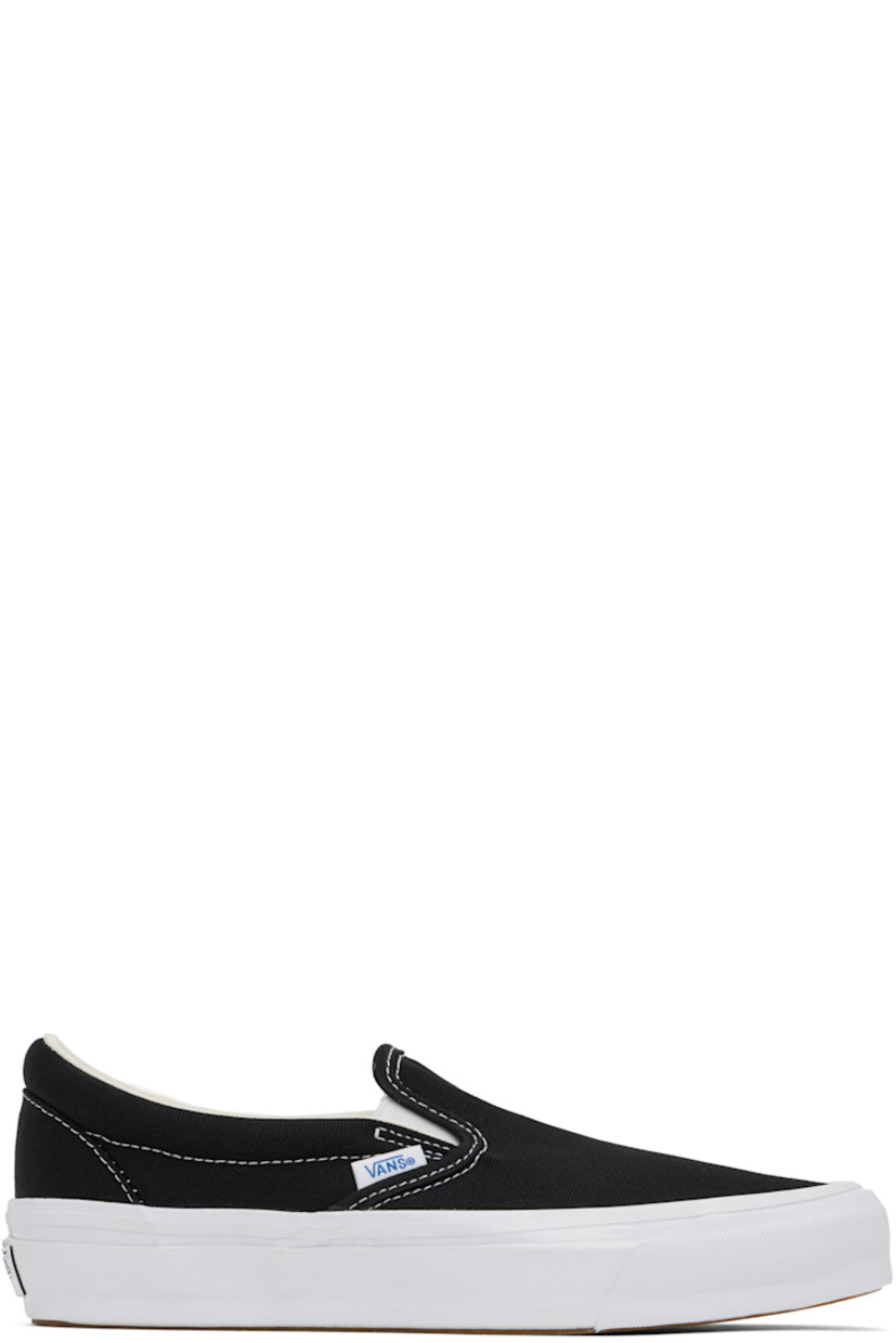 Canvas slip-on sneakers in black.

· Elasticized gussets at vamp
· Padded collar
· Logo flag at outer side
· Rubber logo patch at heel
· Grained leather and canvas lining
· Textured rubber midsole
· Treaded rubber sole
· Contrast stitching in white

Supplier color: Black/White