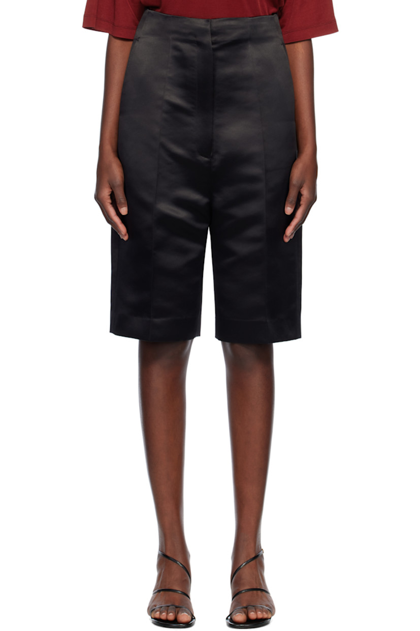 Recycled polyester satin shorts. 

· Two-pocket styling
· Zip-fly
· Creased legs
· Darts at back waistband

Supplier color: Black