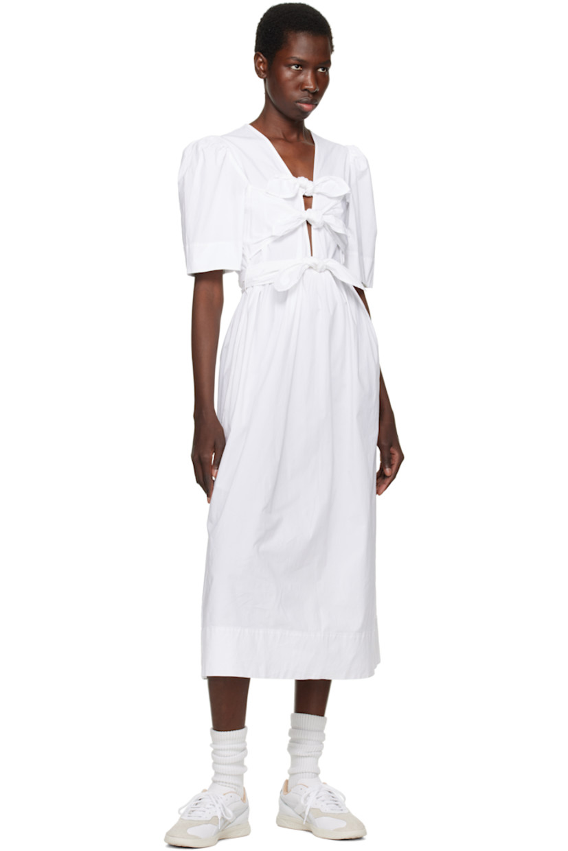 Low-top grained leather sneakers in white.

· Suede trim at toe and sides
· Lace-up closure
· Logo embossed at padded tongue
· Perforations at padded collar and heel
· Signature stripes at sides
· Logo embroidered at heel counter
· Jersey lining
· Textured treaded rubber sole

Supplier color: White/Chalk/Moon