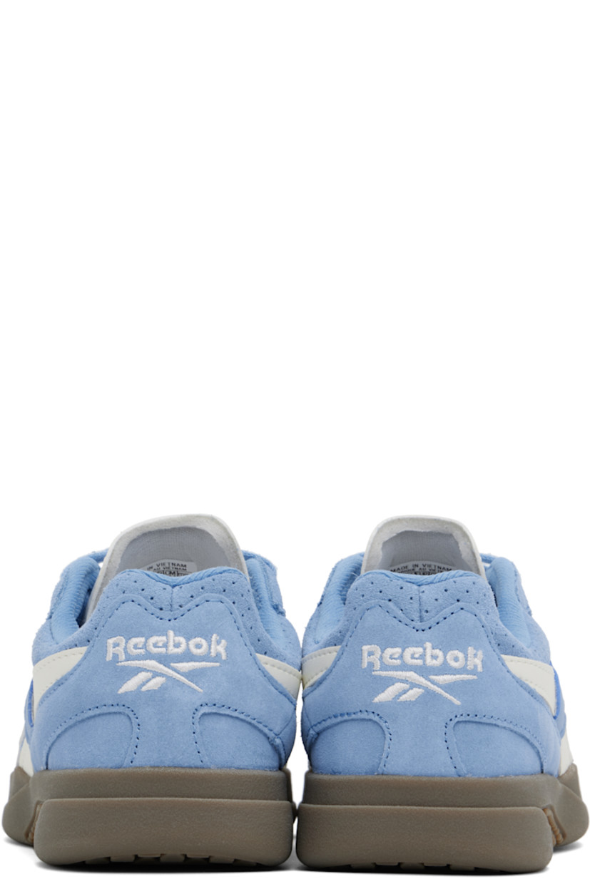 Low-top suede and buffed faux-leather sneakers in blue and white.

· Lace-up closure
· Logo embossed at padded tongue
· Padded collar
· Signature stripes at sides
· Perforated detailing at sides and heel tab
· Logo embroidered at heel counter
· Jersey lining
· Treaded rubber sole

Supplier color: Essential blue/Chalk/Gum