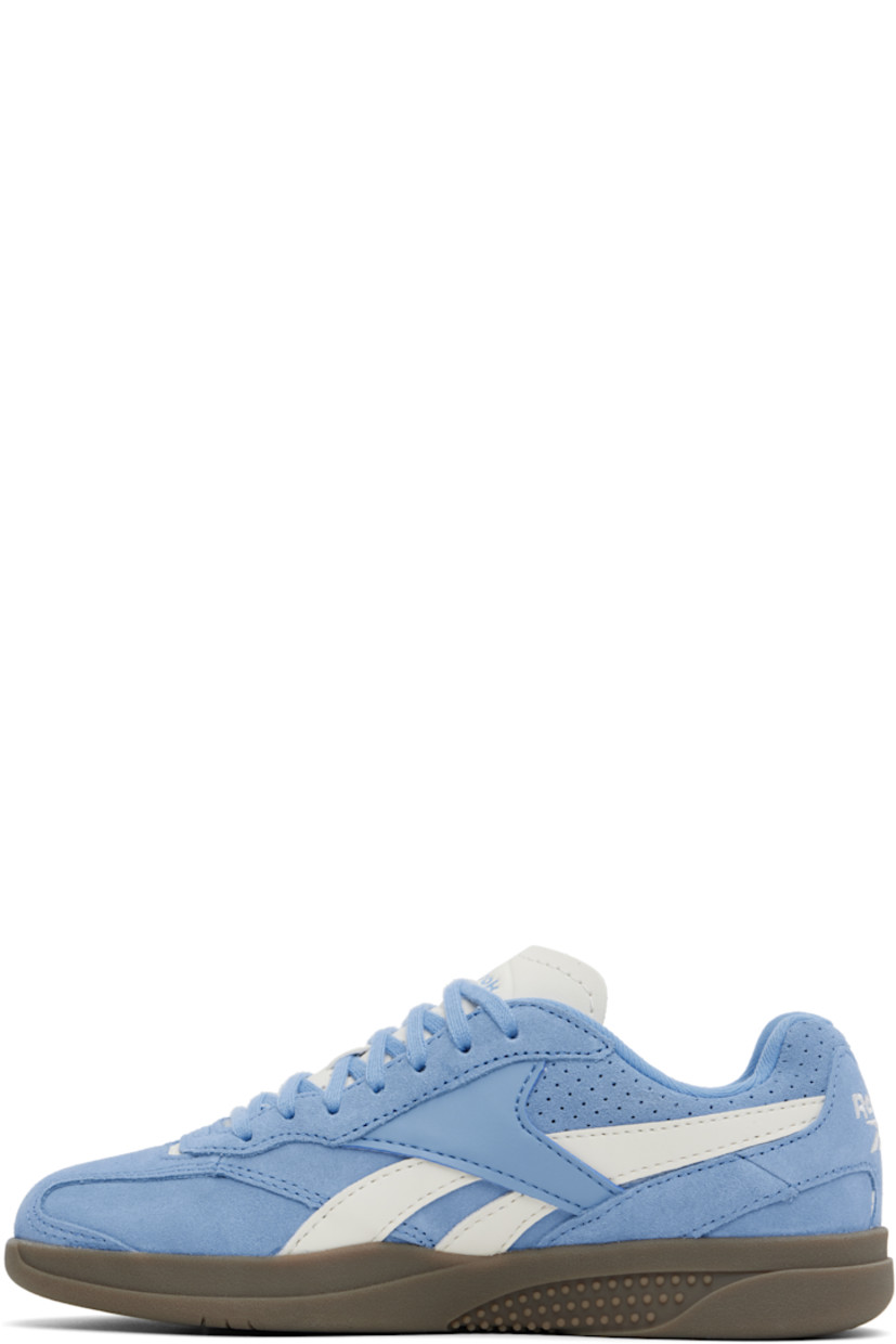 Low-top suede and buffed faux-leather sneakers in blue and white.

· Lace-up closure
· Logo embossed at padded tongue
· Padded collar
· Signature stripes at sides
· Perforated detailing at sides and heel tab
· Logo embroidered at heel counter
· Jersey lining
· Treaded rubber sole

Supplier color: Essential blue/Chalk/Gum