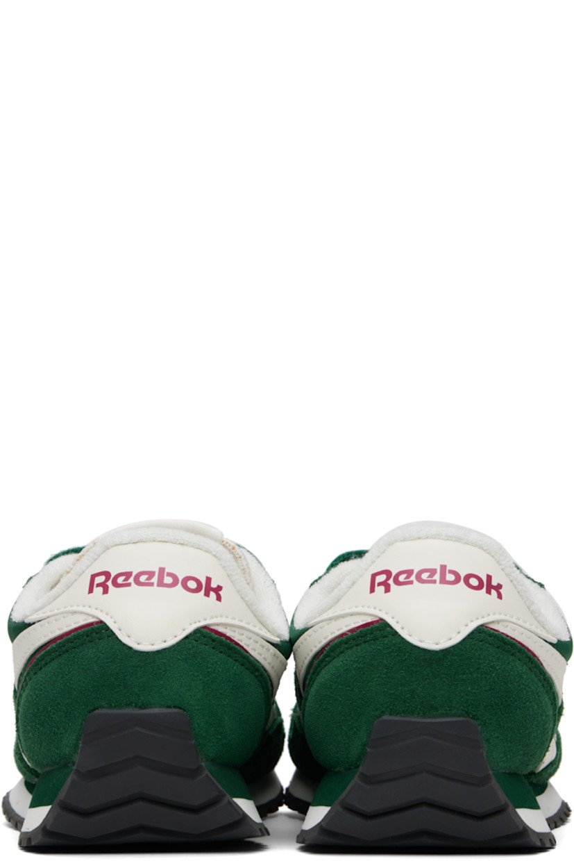 Low-top suede and canvas sneakers in green.

· Buffed leather trim throughout
· Lace-up closure
· Logo flag at padded tongue
· Padded collar
· Signature stripes at sides
· Inset logo patch at outer side
· Logo printed at heel tab
· Piping in burgundy at heel counter
· Terrycloth lining
· Foam rubber midsole
· Treaded rubber sole

Supplier color: Classic green/Classic green/Chalk