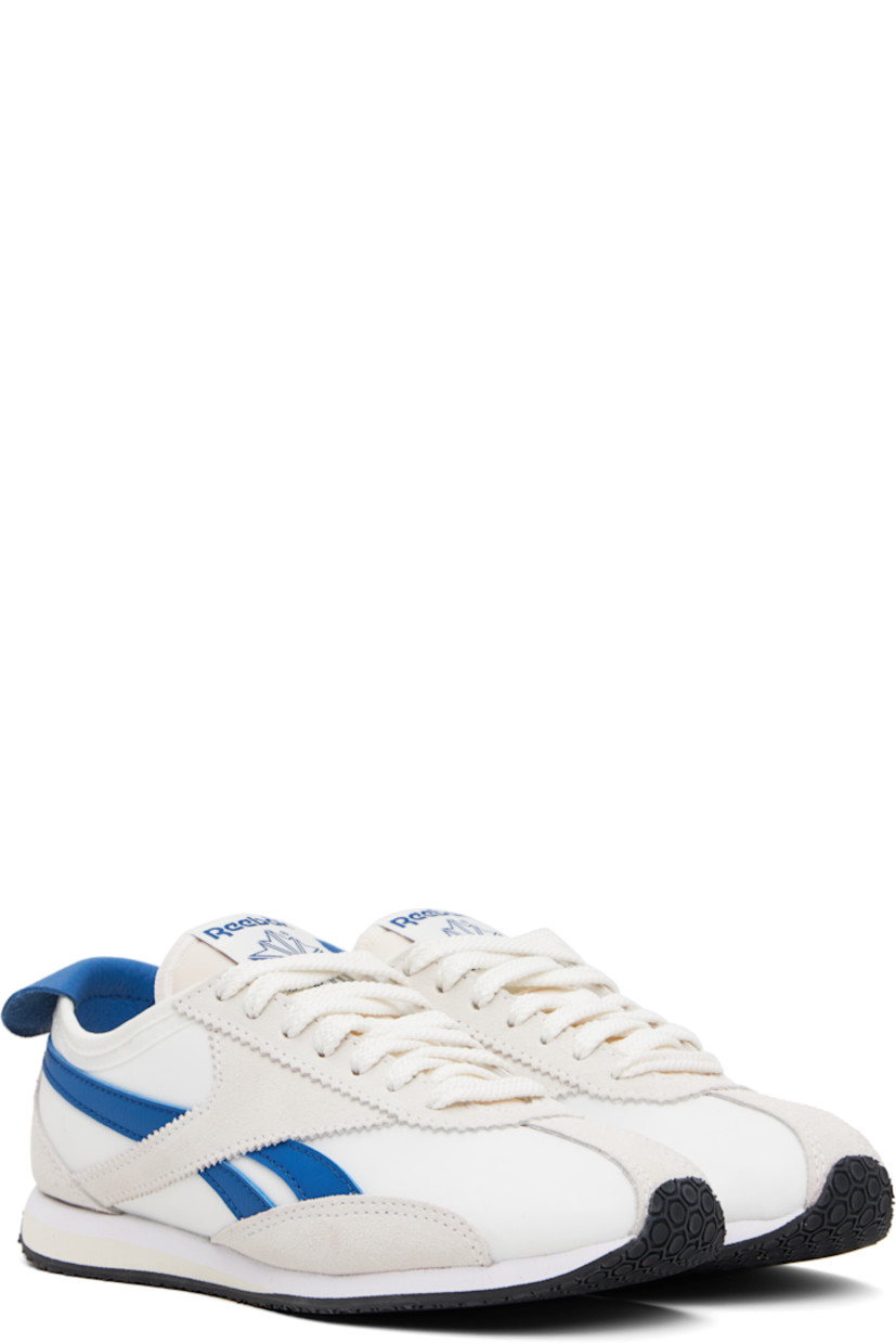 Low-top canvas and suede sneakers in off-white.

· Serrated edge at lace-up closure
· Logo patch at padded tongue
· Padded collar
· Signature stripes at sides
· Logo printed at grained leather foldover heel tab
· Jersey lining 
· Treaded rubber sole

Supplier color: Chalk/Chalk/Twilight blue
