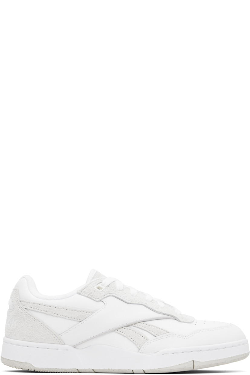 Low-top grained leather and suede sneakers in white and off-white.

· Perforated detailing at toe
· Lace-up closure
· Logo embossed at padded tongue
· Padded collar
· Signature stripes at sides
· Logo embroidered at heel counter
· Jersey lining
· Treaded rubber sole

Supplier color: White/White/White