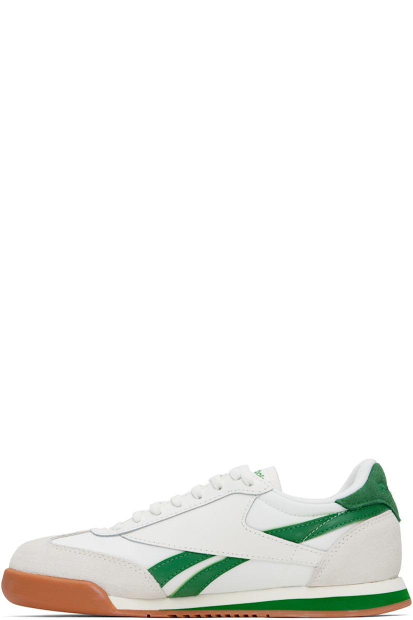 Low-top buffed leather, suede, and mesh sneakers in white and green.

· Lace-up closure
· Logo patch at padded tongue
· Padded collar
· Inset logo patch at outer side
· Signature stripes at sides
· Logo embossed at heel tab
· Jersey lining
· Treaded rubber sole

Supplier color: Chalk/Green/Gum