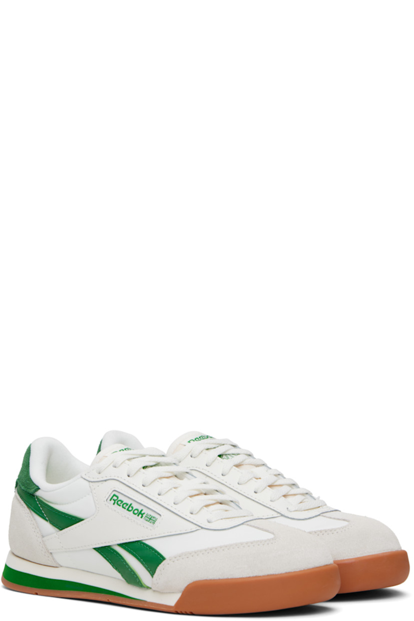 Low-top buffed leather, suede, and mesh sneakers in white and green.

· Lace-up closure
· Logo patch at padded tongue
· Padded collar
· Inset logo patch at outer side
· Signature stripes at sides
· Logo embossed at heel tab
· Jersey lining
· Treaded rubber sole

Supplier color: Chalk/Green/Gum