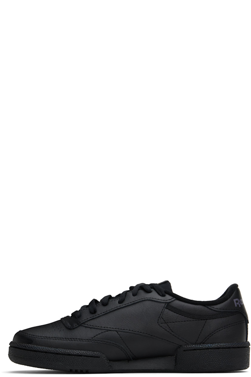 Low-top buffed leather sneakers in black.

· Perforated detailing at vamp
· Lace-up closure
· Logo patch at padded tongue
· Padded collar
· Inset logo patch at outer side
· Logo printed at heel tab
· Terry cloth lining
· Foam rubber midsole
· Treaded rubber sole

Supplier color: Int black/Charcoal
