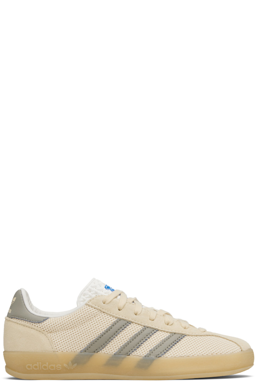 Low-top mesh sneakers.

· Suede trim throughout
· Lace-up closure
· Logo printed at perforated tongue
· Padded collar
· Signature serrated stripes at sides
· Logo printed at heel tab
· Buffed leather lining
· Logo embossed at textured rubber midsole
· Treaded rubber sole

Supplier color: Yellow/Supplier colour/Charcoal