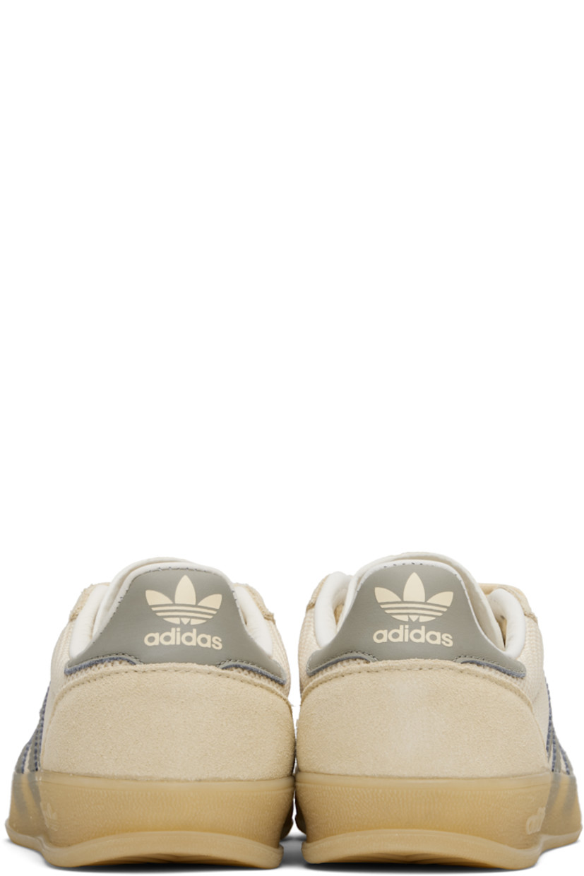Low-top mesh sneakers.

· Suede trim throughout
· Lace-up closure
· Logo printed at perforated tongue
· Padded collar
· Signature serrated stripes at sides
· Logo printed at heel tab
· Buffed leather lining
· Logo embossed at textured rubber midsole
· Treaded rubber sole

Supplier color: Yellow/Supplier colour/Charcoal